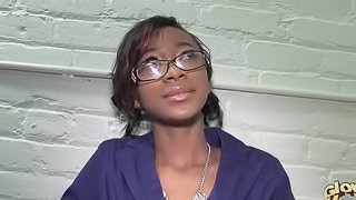 Angelic ebony in glasses showcasing her black butt while giving out stunning blowjob