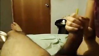 She uses spit to jerk cock
