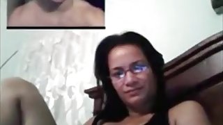 Nerdy girl gets tricked with a fake guy on skype and masturbates